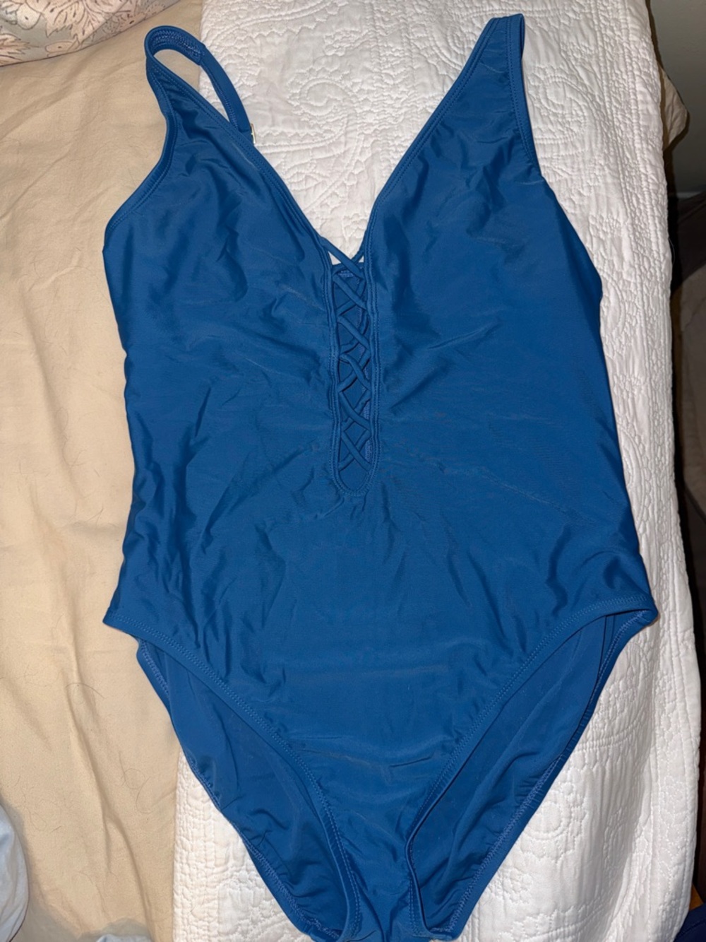 Into the Bleu women’s Blue One-Piece Swimsuit with Lace-Up Front sexy classy